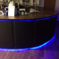 Blue illuminated interior joinery detail by Aaron Steven Construction