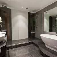 Open-plan bathroom refurbishment by Aaron Steven Construction