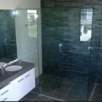 Dark slate wet room installation by Aaron Steven Construction