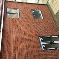 Exterior brickwork and windows renovated by Aaron Steven Construction