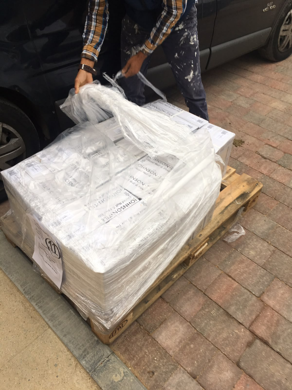 Pallet of floor and wall tiles delivered for an interior tiling project