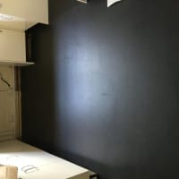 Smooth dark wall finish by Aaron Steven Construction